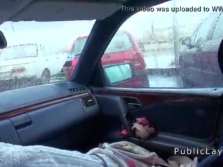 Hairy pussy Russian beauty fucks in the car in public